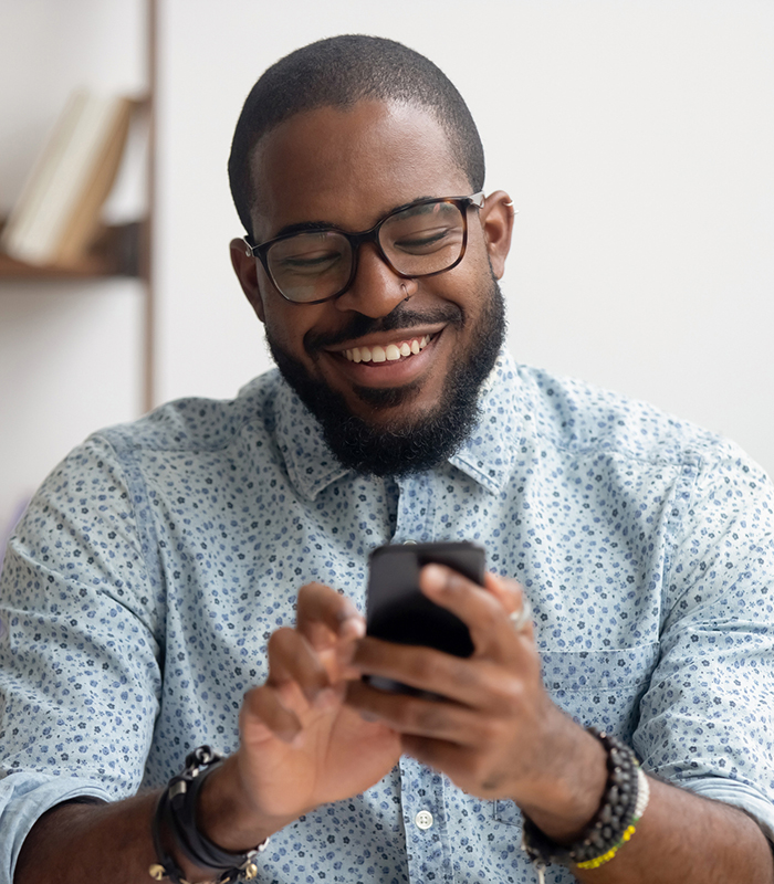 Person using a phone to manage healthcare
